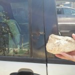 Rock thrown by terrorist barely missed window, Photo credit: Honenu