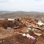 Destruction in Geulat Tzion; Photo credit: "Geulat Tzion-B'Hazon U'Vma'as"