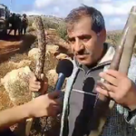 Ibrahim Wadi holding the stick with which he beat the hikers