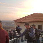 Police in Yitzhar; Photo credit: Honenu